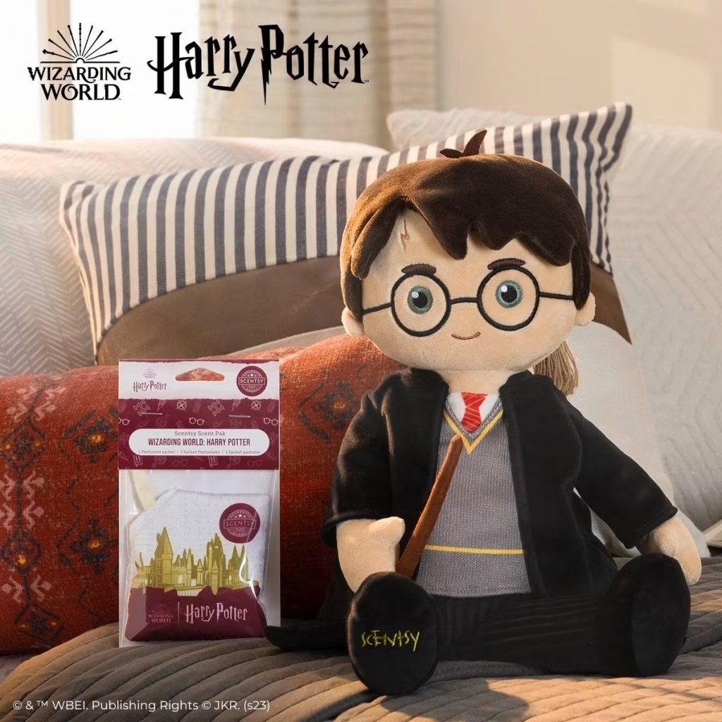 Wizarding World Harry Potter Scentsy Buddy sitting beside the Harry Potter scented Scentsy Scent Pak.