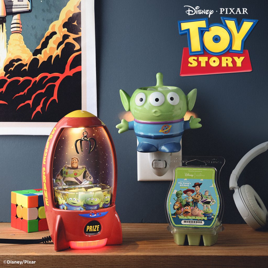 Disney Pixar Toy Story Scentsy collection featuring the Space Crane Warmer, Little Green Alien Mini Warmer and The Gang's All Here Scentsy Bar.