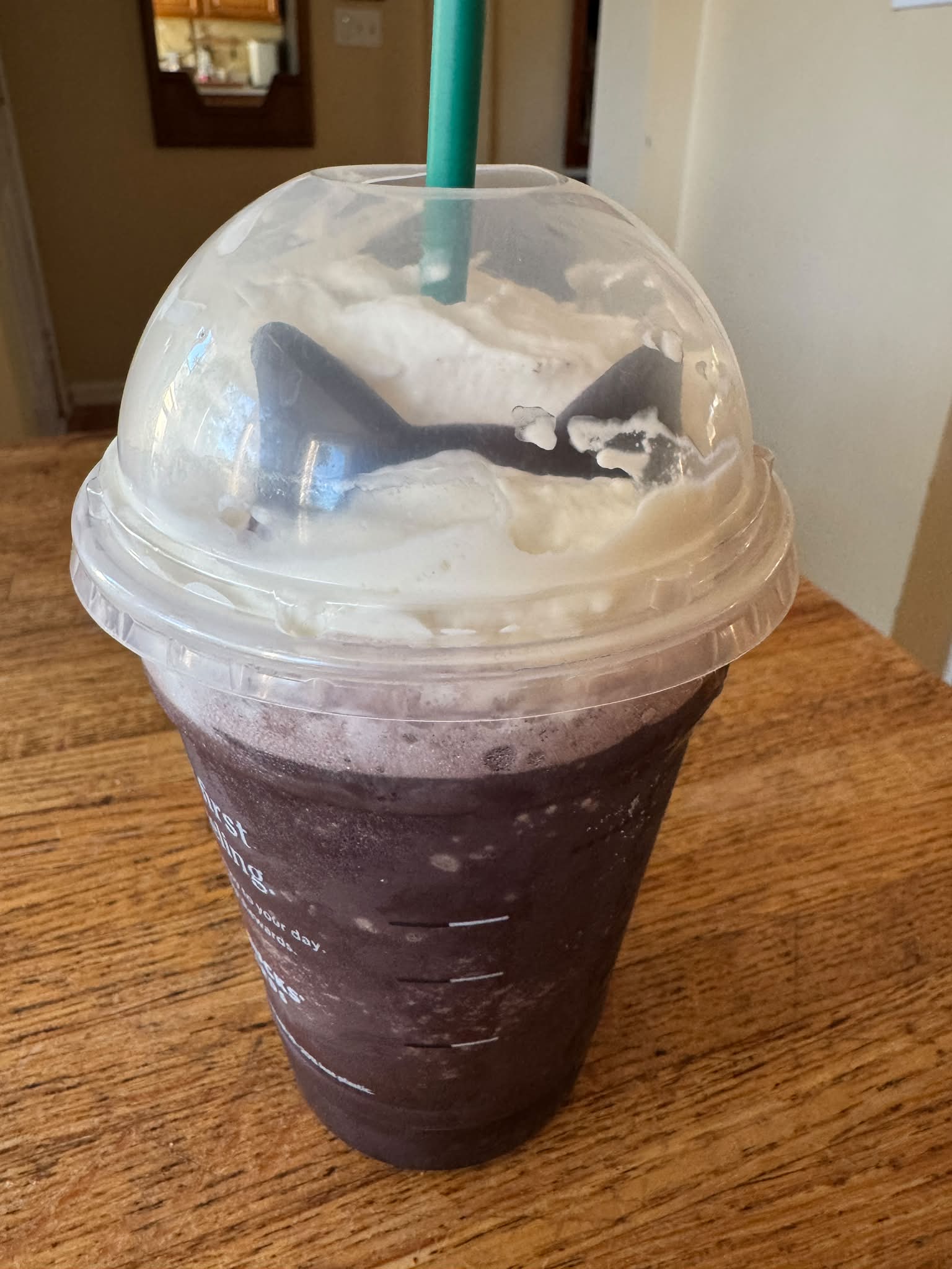 Today is Black Cat Frappuccino Day at Starbucks  so you know we had to get them!!

Tastes like a Hostess Cupcake!!